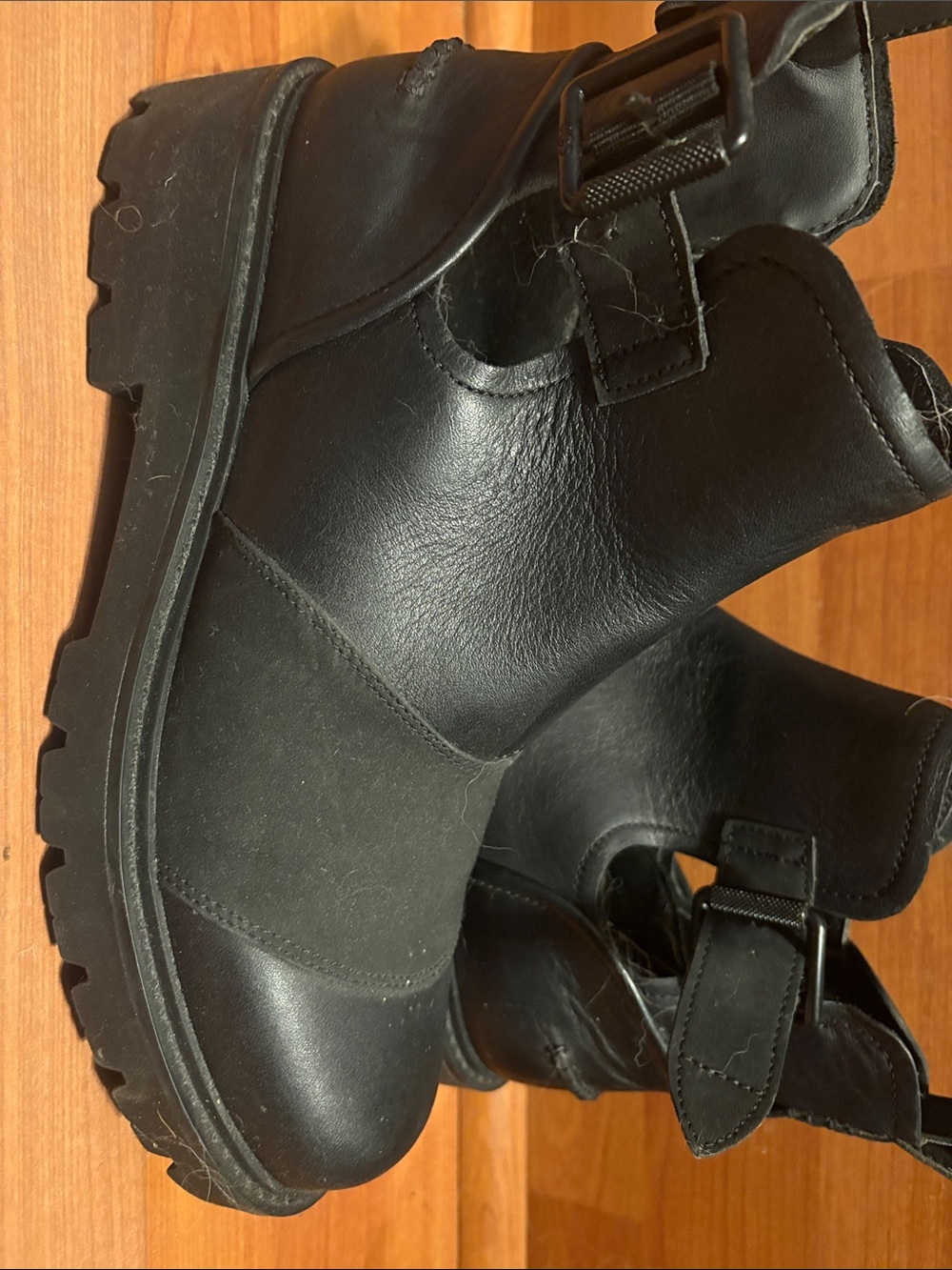 UGG woman’s  Black Leather Buckle Lug Boots